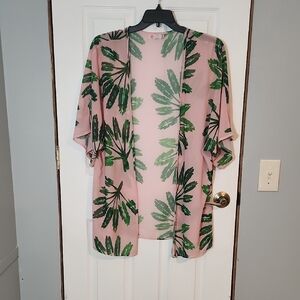 Elegant Pink Kimono with Green Leaf Design